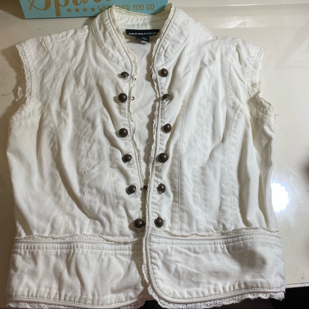 Vintage flare lace trimmed vest with hook and eye closure. Please see all photos